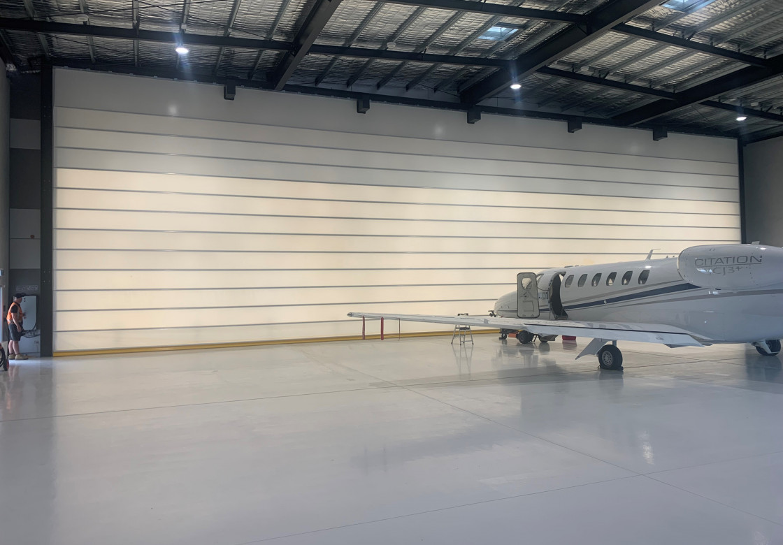Fabric fold-up hangar doors for aircraft hangars in all size » Champion Door